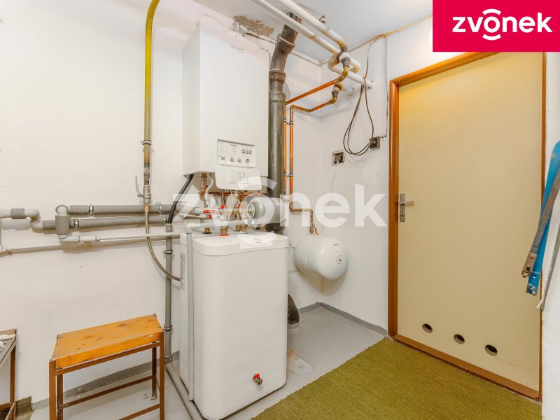 Prodej řadového rodinného domu s garáží a zahradou ve Slavičíně